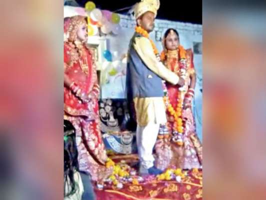 Image result for मध्यप्रदेश : सरपंच पति ने एक ही मंडप में रचाई पत्नी और साली के साथ शादी