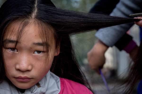 A Photographer Traces Your Hair Extensions All The Way Back To