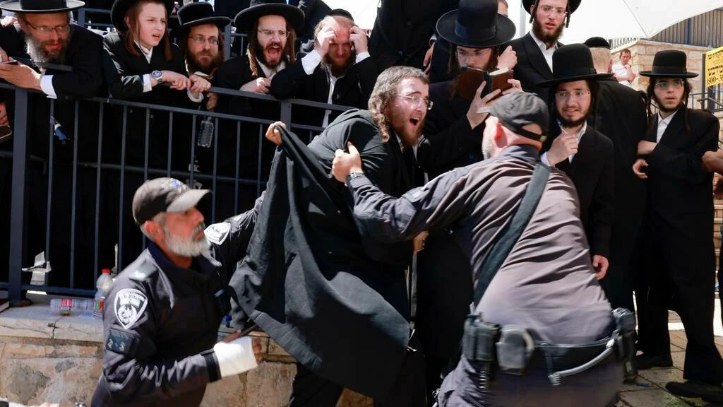 Jewish worshippers clash with police at pilgrimage site in Israel's Mount Meron