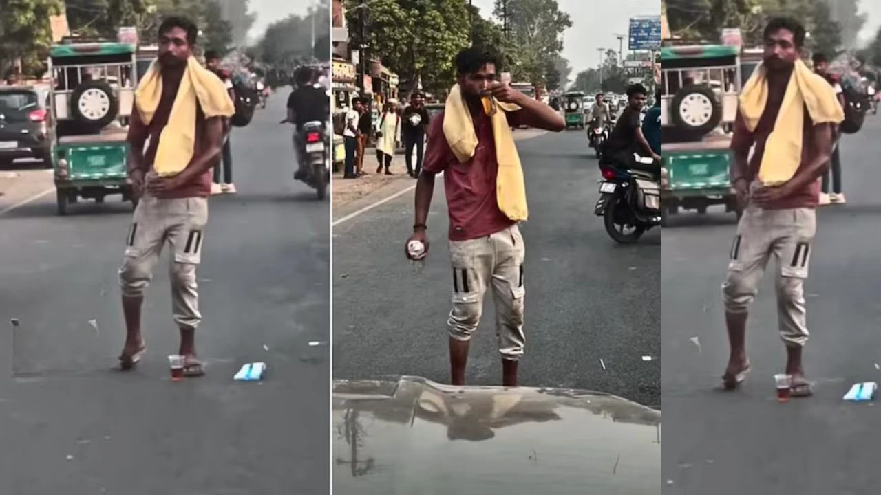 शराब पीकर सड़क पर पैग बनाता शख्स, वीडियो वायरल शराब पीकर सड़क पर पैग बनाता शख्स, वीडियो वायरल