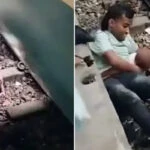 ഓടുന്ന ട്രെയിനിനടിയിലേക്ക് വീണ കുഞ്ഞിനെ അത്ഭുതകരമായി രക്ഷപ്പെടുത്തി പിതാവ്; വീഡിയോ