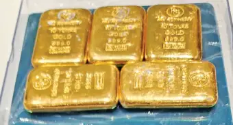Customs seize five gold biscuits worth Rs 88.97 lakhDubai passenger concealed 582.7 gms of gold inside trouser pocket at airport