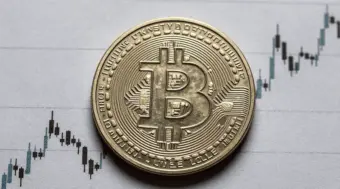 Crypto Prices Today: Bitcoin Holds Near USD 77,368 as CLARITY Act Vote, Fed Decision Collide