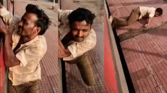'ചാകെടാ; ചത്തു'; മോഷ്ടാവിനെ പിടിച്ചു; ട്രെയിനില്‍ തൂങ്ങി ഓടി വീണു