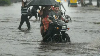 Delhi-NCR rain fury: Car inside ditch, clouds engulf high-rise, severe waterlogging | WATCH
