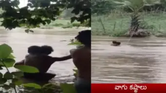 Tribal Boy: అత్యవసర పరిస్థితి.. తాడు పట్టుకుని వాగు దాటిన గిరిజన బాలుడు!