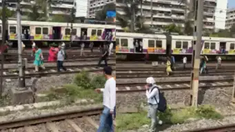 मध्य रेल्वेचा खेळखंडोबा, भर उन्हात प्रवासी ट्रॅकवर, लोकल एकाच ठिकाण अडकून..