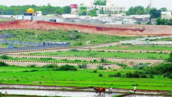 ఖమ్మం: కబ్జా కోరల్లో రూ.400 కోట్ల ప్రభుత్వ స్థలం.. డొంక రహదారిలో నిర్మాణాలు