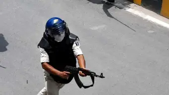Bihar: Policeman fired for using AK-47 during protest