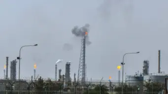 Iran Escalates Tensions with Missile Strikes on Kuwait Amid US Attacks