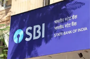 SBI Q1 Results FY27: સ્ટેટ બેંક ઓફ ઈન્ડિયાનો ચોખ્ખો નફો ₹21,121 કરોડ રહ્યો, શેર માટે ₹1,300 નો નવો ટાર્ગેટ