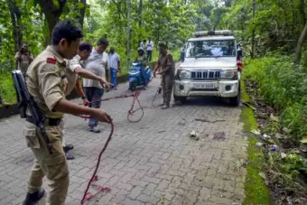 Man accused of decapitating wife dies after jumping from police vehicle in Assam