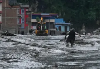 Nepal flood death toll rises to 392; rescue teams battle mounds of mud and debris