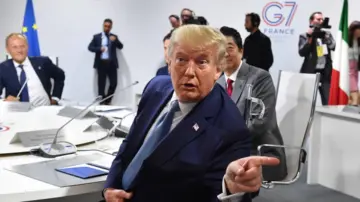 'We'll go back to dropping bombs on their heads': Trump warns Iran deal 'not final' ahead of formal signing