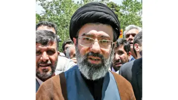 Don blows hot & cold over deal with IranWarns strikes if Tehran misbehaves; Iran gets oil, sanctions relief, $300bn package