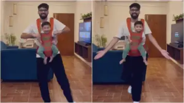 बेबी कैरियर में बेटी को लेकर डांस करता दिखा पिता, क्यूट वीडियो ने जीता लोगों का दिल