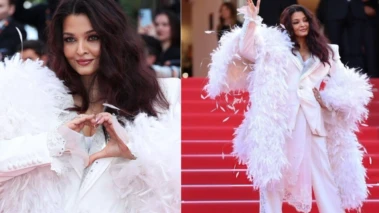Cannes 2026: Aishwarya Rai Bachchan Stuns in Dramatic White Feathered Pantsuit by Cheney Chan