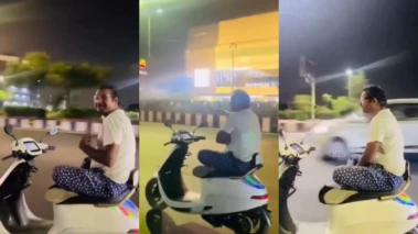 Viral Video: Man Riding An Electric Scooter Cross Legged and Hands Free in Lucknow, Video Sparking Outrage on Social Media - WATCH