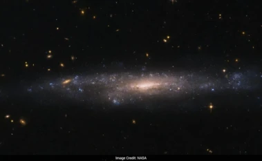 NASA's Hubble Telescope Spots Mysterious Dim Galaxy Hidden In Space