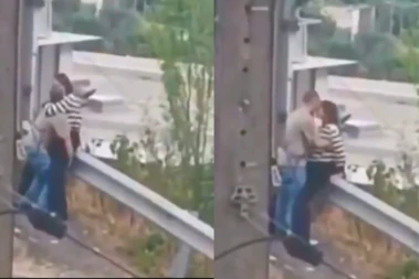 Viral Video: Falling In Love Literally.., Boy And Girl Get Cozy On A Roadside Railing, What Happens Next Is Unbelievable, Watch
