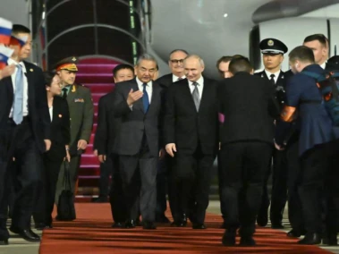 Putin arrives in Beijing for state visit days after Trump's China trip