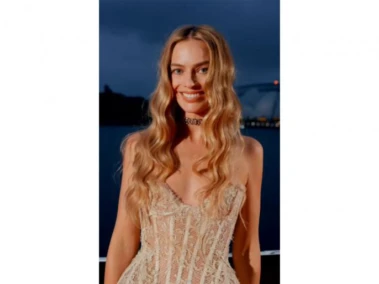 Emerald Fennell says she regrets cutting Margot Robbie's "extremely hairy armpits" scene from 'Wuthering Heights'