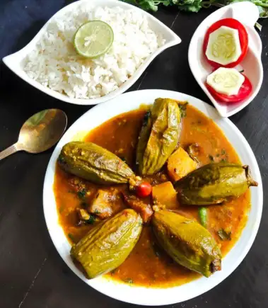 দুপুরের পাতে নতুন চমক! একঘেয়ে পটল নয়, বানিয়ে ফেলুন রাজকীয় 'পটলের দোলমা'