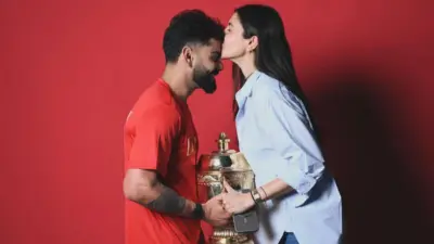 Anushka Sharma Proudly Kisses Virat Kohli To Celebrate Bengaluru`s Historic Win