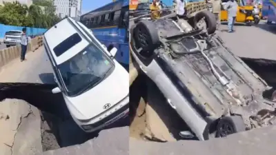 சாலையில் ஏற்பட்ட திடீர் பள்ளத்தில் சிக்கிய கார்!