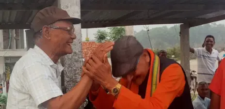 Political Rivalry or Old Friendship? TMC Veteran Seen Blessing BJP's Haradhan Sarkar