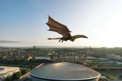 Giant flying dragon Scotland : স্কটল্যান্ডের আকাশে উড়ল বিশালাকার ড্রাগন!