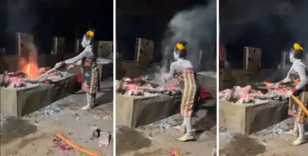 சுடுகாட்டில் எரியும் பிணத்தின் மாமிசத்தை வாளால் எடுத்து உண்ணும் பெண்... நெஞ்சை உறைய வைக்கும் அதிர்ச்சி வீடியோ!