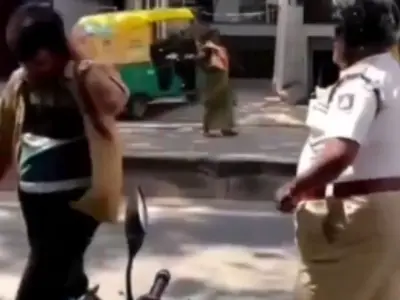 Bengaluru Traffic Police Seen Slapping Auto Driver