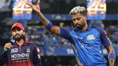 టాస్ గెలిచిన ఆర్సీబీ.. ముంబైని బ్యాటింగ్కు ఆహ్వానం