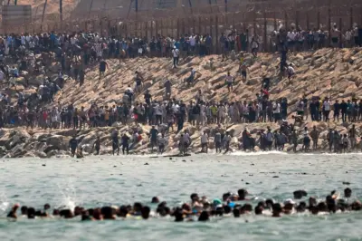 At least 18 dead as thousands cross into Spain from Morocco in fresh border crisis
