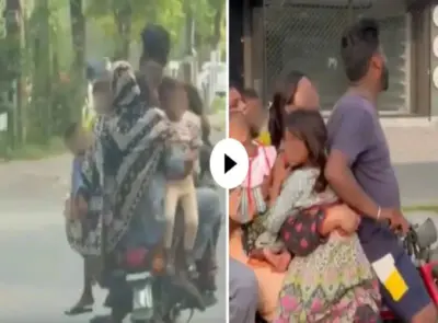 एक ही बाइक पर 9 लोग सवार; VIDEO देखकर चकरा जाएगा आपका सिर, यहाँ देखें