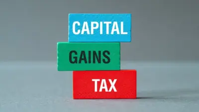 Selling an inherited house? Can you buy 2 flats and still claim LTCG tax exemption?
