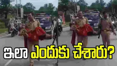 మహిళను ఆస్పత్రికి తీసుకెళ్లిన పోలీస్.. మండిపడుతున్న నెటిజన్లు..
