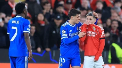 Vinicius reports racial abuse during Madrid's 1-0 win vs Benfica, forcing referee to halt play amid on-field tensions