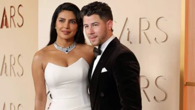 Oscars 2026: Priyanka Chopra Stuns In White Dior Couture, Nick Jonas' Kalava Sparks Online Buzz