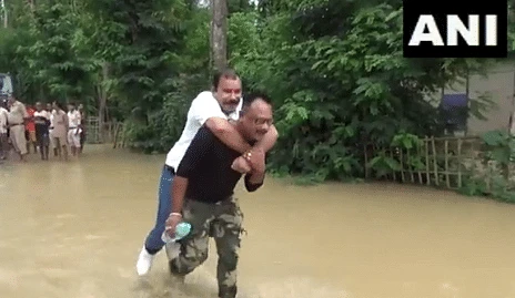 Watch Video: Assam BJP MLA slammed by netizens for piggyback ride during flood review