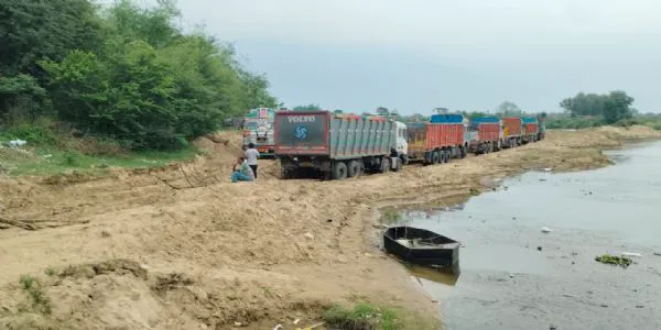 Villagers protest against illegal sand mining, bamboo bridge at risk of collapse
