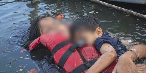 ലൈഫ് ജാക്കറ്റും ധരിച്ച് പൊന്നോമനയെ മാറോടണച്ചുള്ള അമ്മയുടെ മൃതദേഹ ചിത്രം: വ്യാജമെന്ന് കളക്ടര്; ചിത്രത്തിന് ബര്ഗി ഡാം അപകടവുമായി യാതൊരു ബന്ധവുമില്ല; 'പ്രചരിപ്പിക്കുന്നവര്ക്കെതിരെ കര്ശന നടപടി സ്വീകരിക്കും'