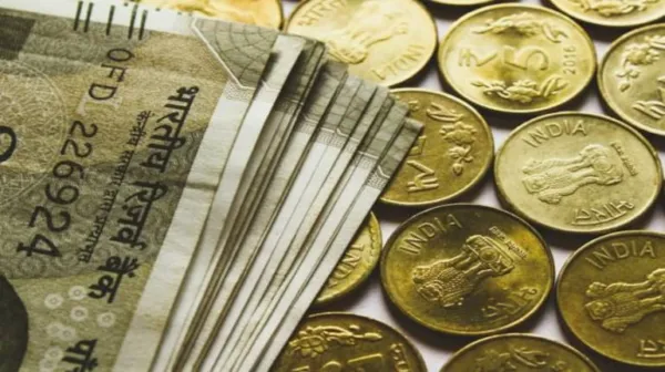Rupee slumps 23 paise, settles below 74/USD level