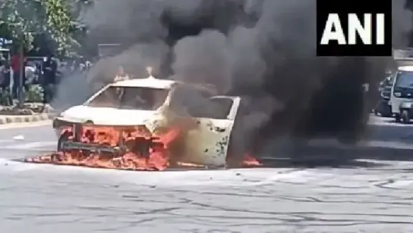 Car catches fire on Delhi's Mehrauli-Badarpur Road amid heatwave, no injuries reported