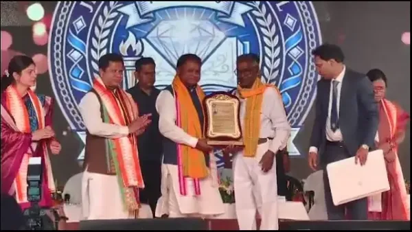 Chief Minister Mohan Majhi touches feet of his teacher, announces Rs 20 crore for Jhumpura High School in Keonjhar