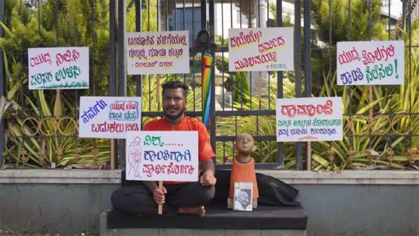 Kundapura Activist Ramanji Holds Solo Silent Protest Advocating for Global Peace and Child Rights