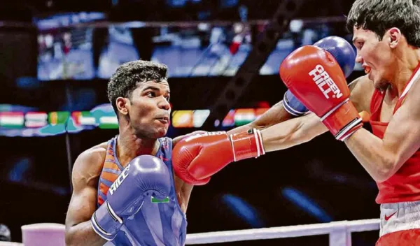 India's Vishvanath stuns world champion, advances to Asian Boxing semifinals