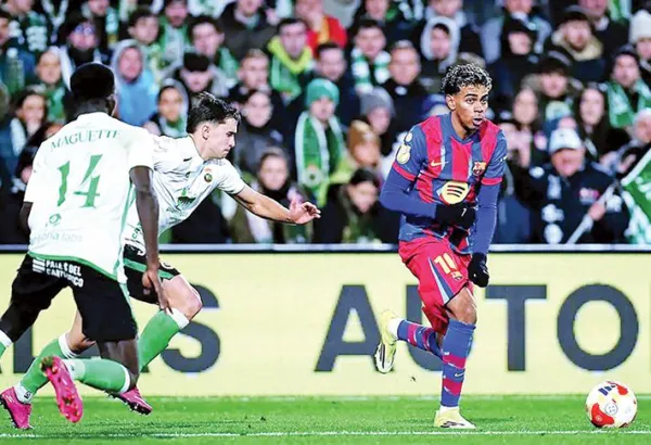 Defending champion Barcelona in quartersBeat Racing Santander 2-0 in Copa del Rey