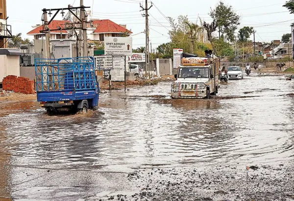 Pain and gain:  Two sides of Sunday rainCity heaves sigh of relief; heavy rain, hailstorms damage standing crops in parts of N Guj; lightning kills 1 in Viramgam